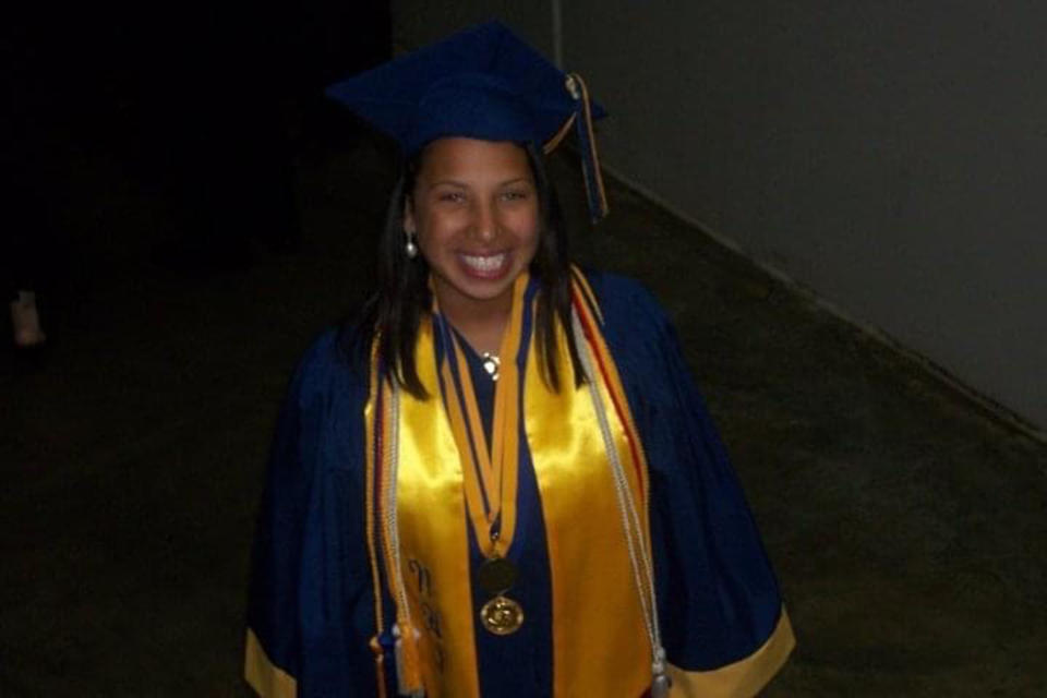 Stephanie Loraine Piñeiro, smiling at her high school graduation. She graduated with honors and an associate's degree. (Courtesy Stephanie Loraine)