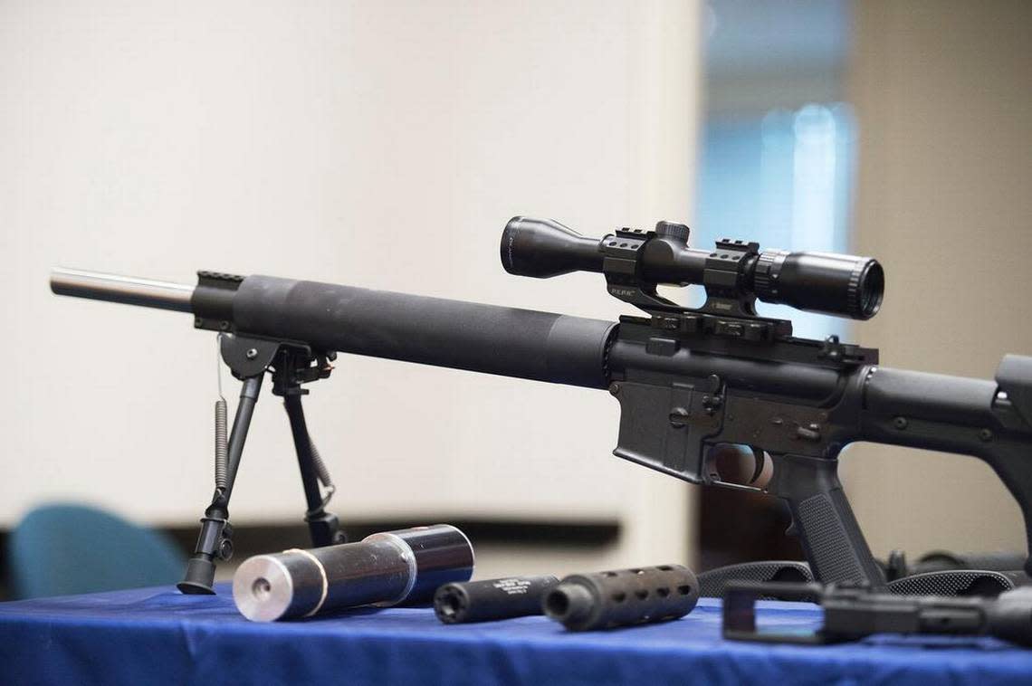 An assault rifle with a scope attached. Washington lawmakers are preparing to ban weapons such as this from being sold, distributed and manufactured in the state. Randy Pench/rpench@sacbee.com