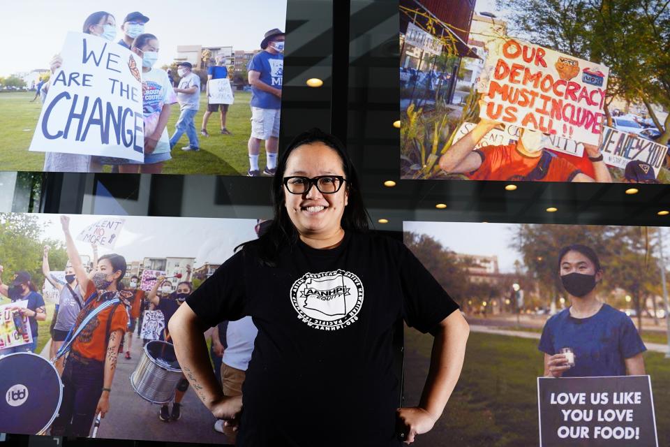 Jennifer Chau, director of the Arizona Asian American Native Hawaiian and Pacific Islander For Equity Coalition, at her office Friday, April 8, 2022, in Tempe, Ariz. (AP Photo/Ross D. Franklin)