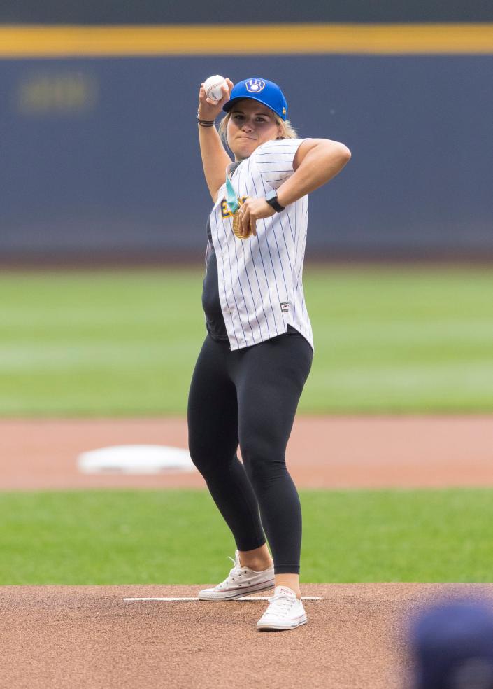 Brianna Decker of Dousman, who helped the U.S. women win a gold medal in hockey at the Pyeongchang Olympics in 2018, threw out the ceremonial first pitch prior to a Brewers game.