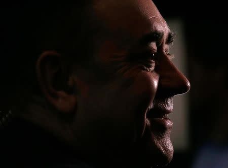 Alex Salmond, the former Scottish National Party who is now running for Parliament, speaks to television journalists at a counting centre in Aberdeen, Scotland, May 8, 2015. REUTERS/Cathal McNaughton