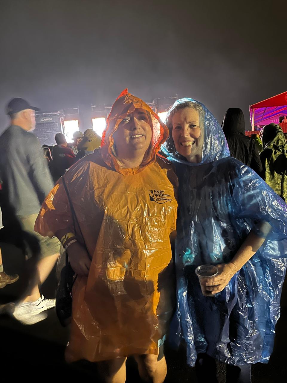 Angie McDermott was volunteering and came back with her high school friend, Jude Weber. When McDermott was leaving her house, she grabbed ponchos at the last minute and said she looked “like a pumpkin," but was glad she had them when the rain started Saturday at Bourbon & Beyond.