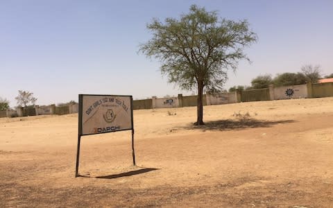 A signpost of the Government Girls Science and Technical College is pictured in Dapchi  - Credit:  REUTERS