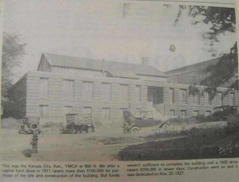 A news article from the Kansas City, Kansan dated Feb. 15, 1987, shows a photo of the YMCA in 1911 during the first phase of construction. The building was dedicated on Nov. 20, 1927.