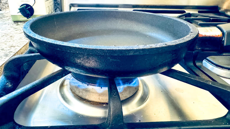 frying pan on stove burner