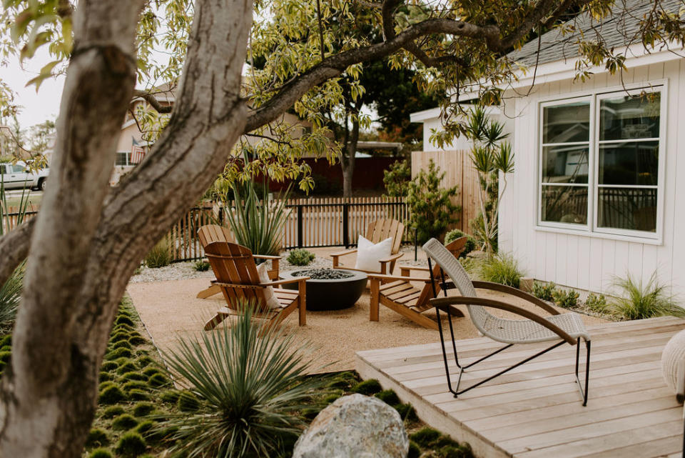 a seating area in a front yard