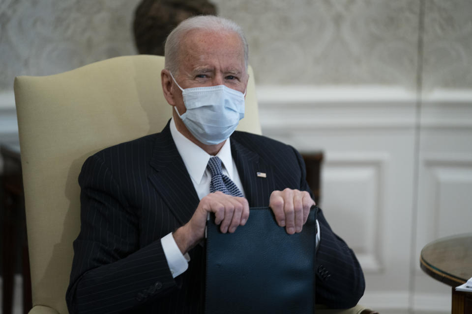 President Joe Biden meets with Senate Majority Leader Sen. Chuck Schumer of N.Y., and other Democratic lawmakers to discuss a coronavirus relief package, in the Oval Office of the White House, Wednesday, Feb. 3, 2021, in Washington. (AP Photo/Evan Vucci)