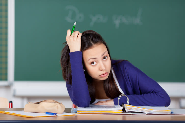 <span class="caption">Children learn far more than just traditional education in schools.</span> <span class="attribution"><a class="link " href="http://www.shutterstock.com/pic-140469271/stock-photo-unhappy-female-student-having-stress-at-school.html?src=AVdMS7gST0rFMtFA_KzL1A-1-0" rel="nofollow noopener" target="_blank" data-ylk="slk:Shutterstock/racorn;elm:context_link;itc:0;sec:content-canvas">Shutterstock/racorn</a></span>