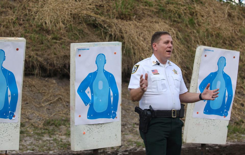 Indian River County Sheriff Eric Flowers makes an announcement at the agency's shooting range, Monday, Dec. 4, 2023, regarding a department-wide switch to the 9mm FN 509 after a deputy was shot by an accidental firearm discharge over the summer in Indian River County.