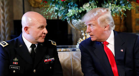 U.S. President Donald Trump and his newly appointed National Security Adviser Army Lt. Gen. H.R. McMaster (L) speak during the announcement at his Mar-a-Lago estate in Palm Beach, Florida U.S. February 20, 2017. REUTERS/Kevin Lamarque