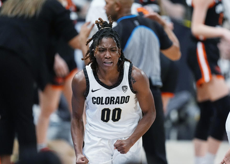 Colorado guard Jaylyn Sherrod reacts after driving to basket to score in the first half of an NCAA college basketball game against Oregon State, Sunday, Feb. 11, 2024, in Boulder, Colo. (AP Photo/David Zalubowski)