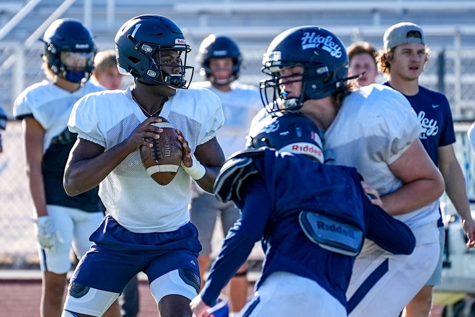 Higley High School football quarterback Jamar Malone, a sophomore, attends practice at the campus football field in Gilbert on Nov. 15, 2022.