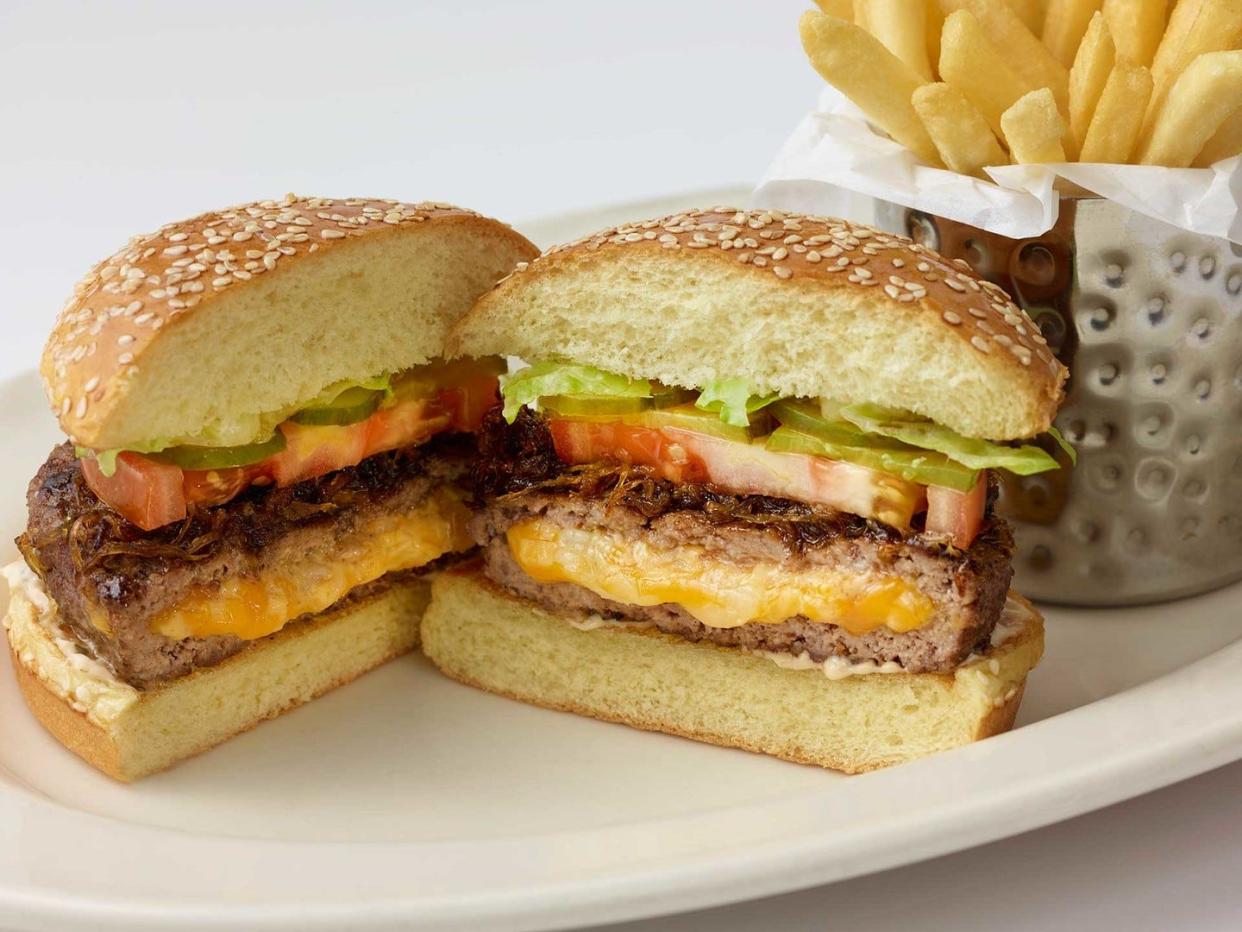 Gooey cheese is hidden inside Cheesecake Factory's stuffed cheddar burger.