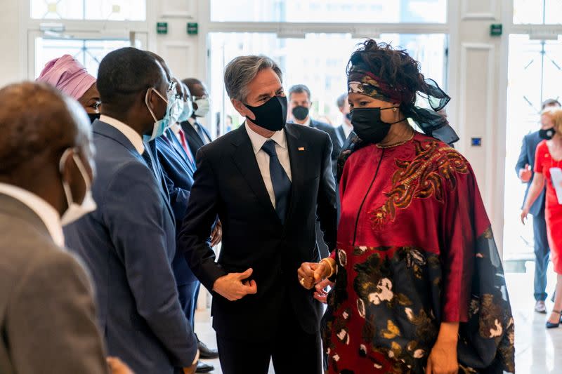 U.S. Secretary of State Blinken is greeted by Senegalese Foreign Minister Tall Sall in Dakar