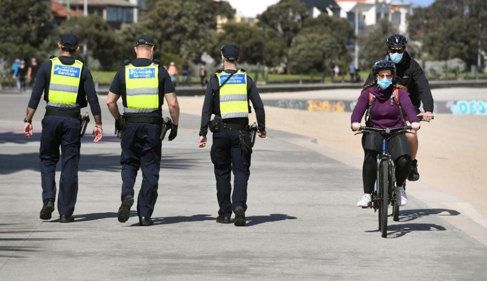 Protective services officers patrol along the St Kilda Beach on September 3. Source: Getty