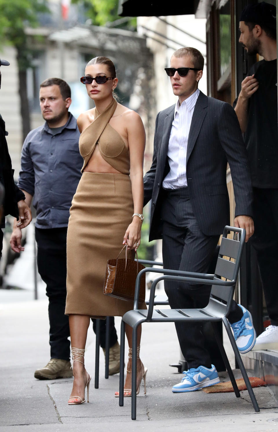 Hailey Baldwin, wearing LaQuan Smith, and Justin Bieber in Paris on June 21, 2021. - Credit: KCS Presse / MEGA