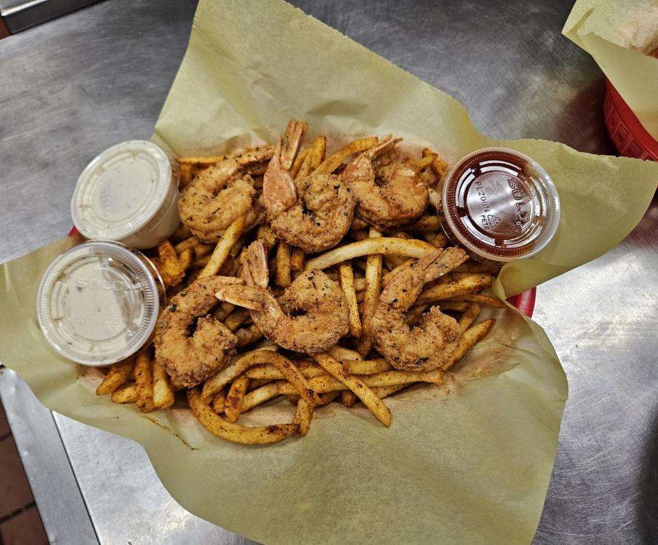 The Louisiana Shabang shrimp basket served with Cajun fries and dipping sauces.