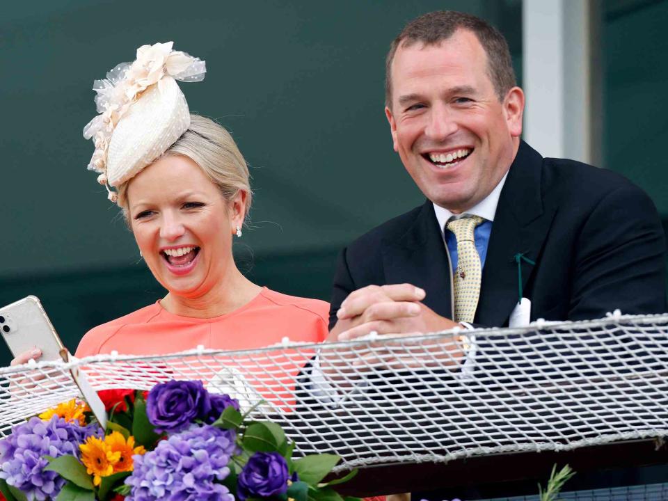 <p>Max Mumby/Indigo/Getty</p> Lindsay Wallace and Peter Phillips at the Epsom Derby in June 2022
