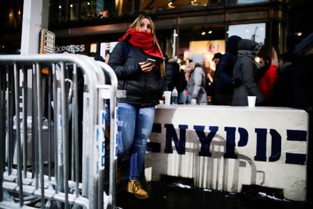 New York Police Department bollards are seen on a sidewalk in Times Square, to provide security against ramming attacks, ahead of New Year's Eve celebrations in Manhattan, New York, U.S. December 30, 2017. REUTERS/Eduardo Munoz