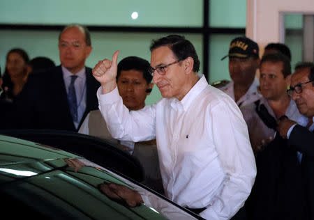 Peru's Vice President Martin Vizcarra gestures to supporters after arriving in Lima, Peru March 23, 2018. REUTERS/Guadalupe Pardo
