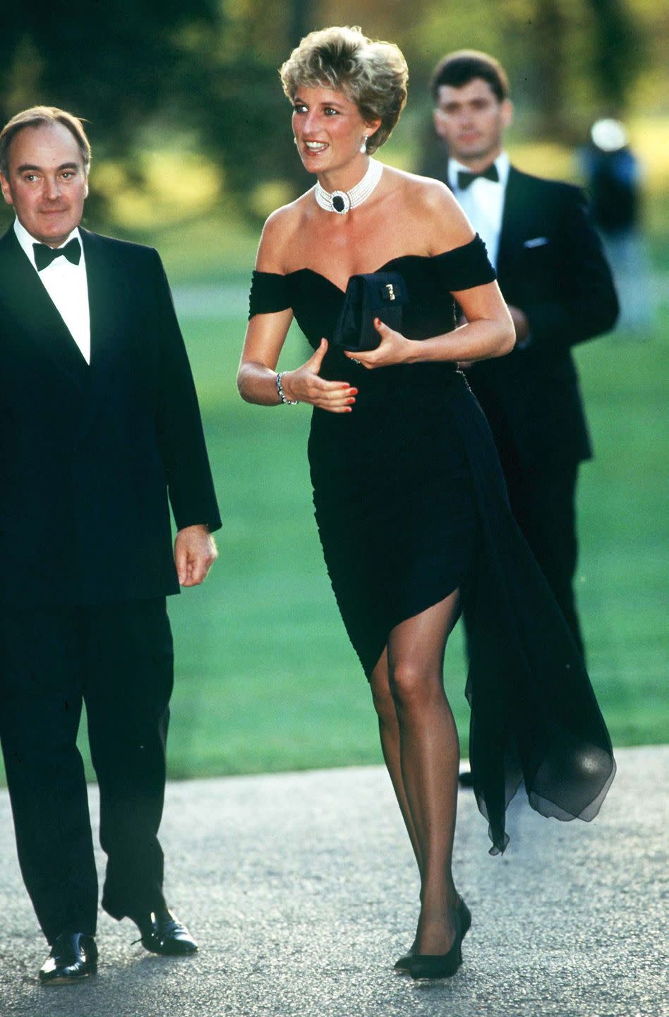 <p>And finally, that giant sapphire took on new significance as accessory to Princess Diana's infamous <a href="https://www.townandcountrymag.com/style/fashion-trends/a36120274/princess-diana-revenge-glamour-trend/" rel="nofollow noopener" target="_blank" data-ylk="slk:revenge dress;elm:context_link;itc:0;sec:content-canvas" class="link ">revenge dress</a> moment in 1994.</p>