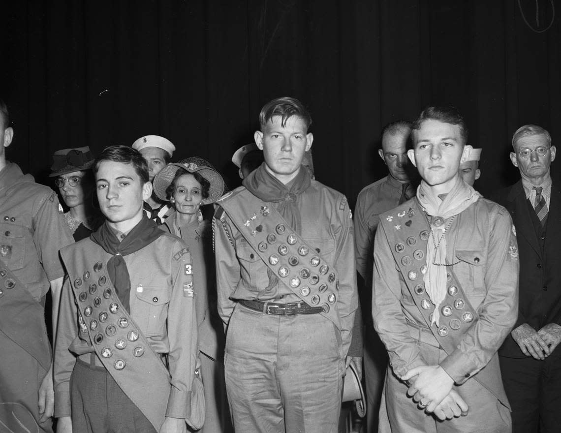 Feb. 14, 1942: At the annual meeting of the Fort Worth Council, Boy Scouts of America, at Will Rogers Auditorium, Jack Jackson, Raymond Worthington and James Irvine (left to right) were presented with Silver Beaver awards. They are wearing their scout uniforms and sashes that display all the badges they have earned. Fort Worth Star-Telegram archive/UT Arlington Special Collections