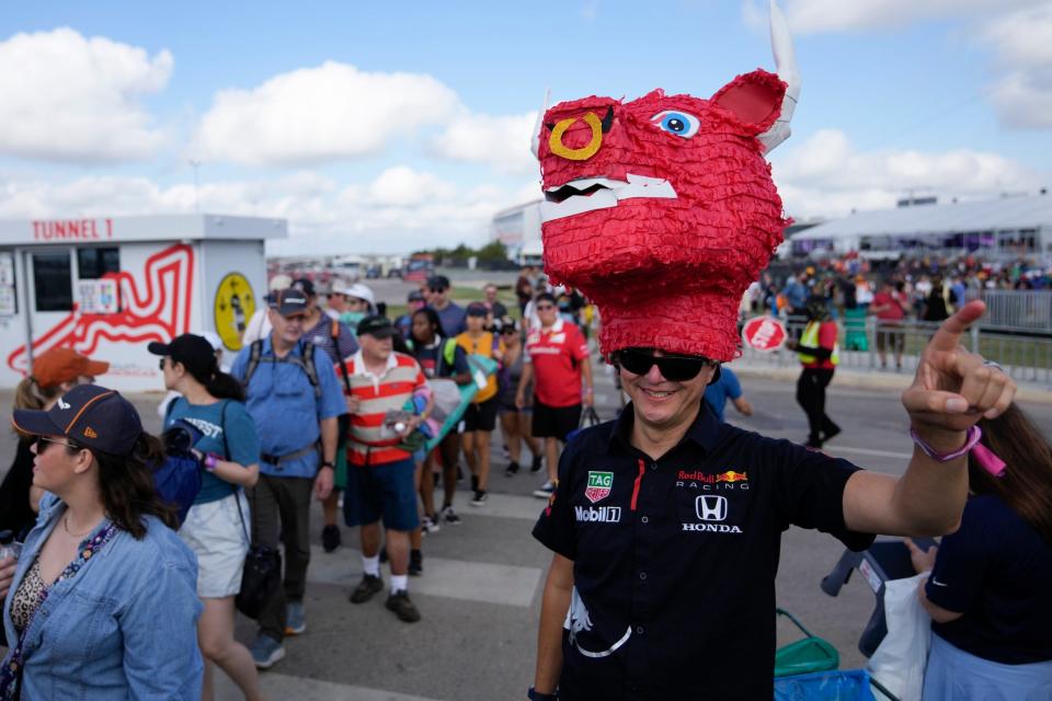 Fans arrive before a practice session for the Formula One U.S. Grand Prix auto race at at the Circuit of the Americas