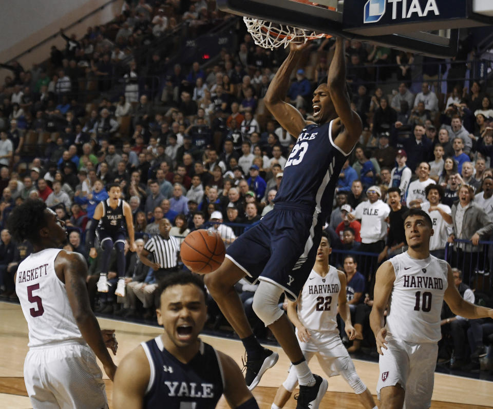 Yale's Jordan Bruner dunks the ball during the second half of an NCAA college basketball game for the Ivy League championship against Harvard at Yale University in New Haven, Conn., Sunday, March 17, 2019, in New Haven, Conn. (AP Photo/Jessica Hill)