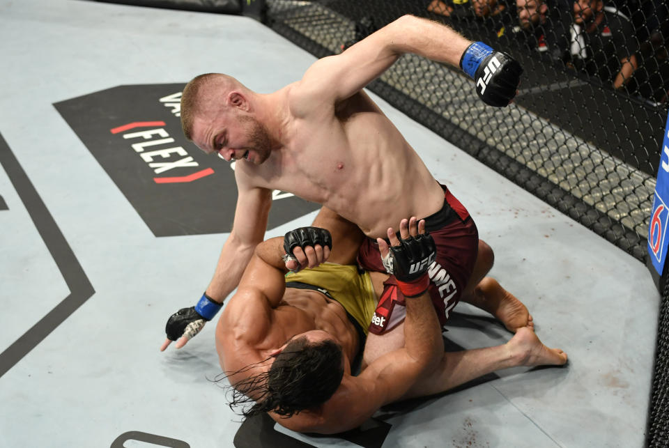 VANCOUVER, BRITISH COLUMBIA - SEPTEMBER 14:  (R-L) Tristan Connelly of Canada punches Michel Pereira of Brazil in their middleweight bout during the UFC Fight Night event at Rogers Arena on September 14, 2019 in Vancouver, Canada. (Photo by Jeff Bottari/Zuffa LLC/Zuffa LLC)