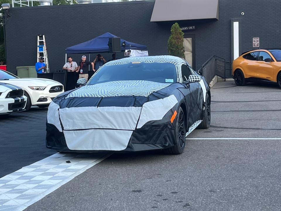 The next generation Ford Mustang appears in disguise on the eve of the 2022 Woodward Dream Cruise on Friday, August 19, 2022.