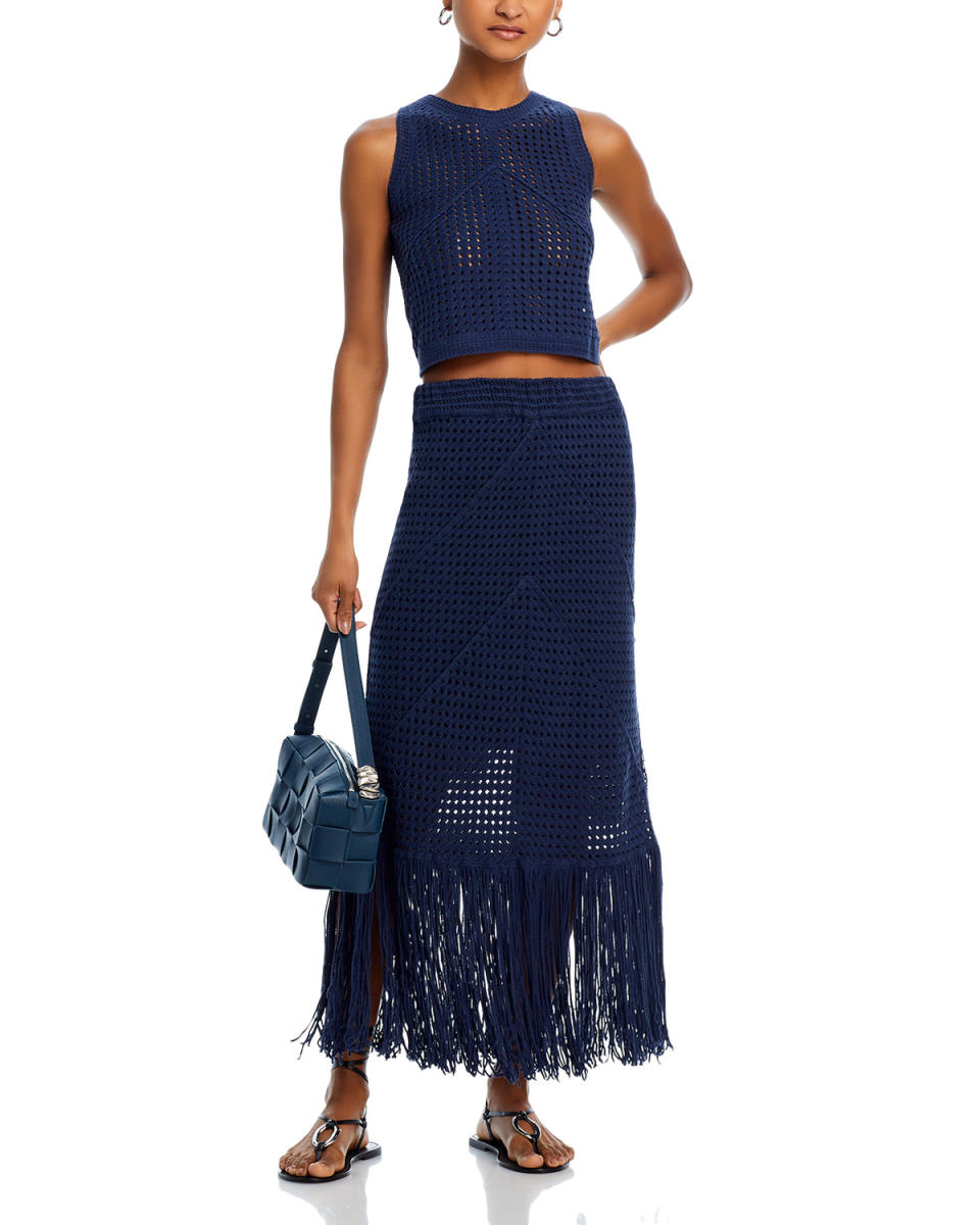 AQUA's crochet tank top and fringe maxi skirt.