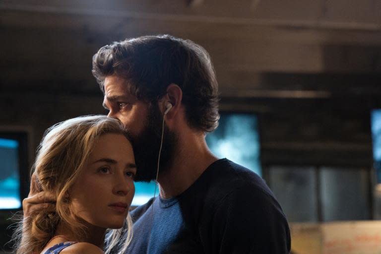 Evelyn Abbott (Emily Blunt) and&nbsp;Lee Abbott (John Krasinski) share a dance and headphones in "A Quiet Place." (Photo: Jonny Cournoyer/Paramount Pictures)