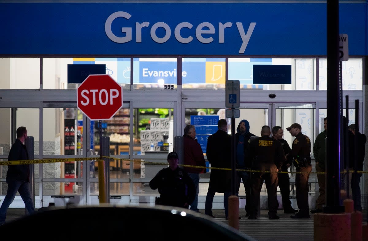 Emergency responders at the scene of a shooting at the West Side Walmart in Evansville, Indiana (AP)