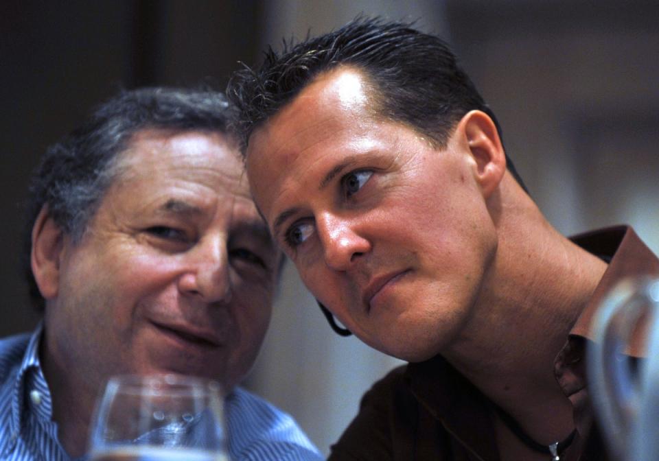 Former Ferrari boss Jean Todt (left) has a close relationship with the Schumacher family (AFP via Getty Images)