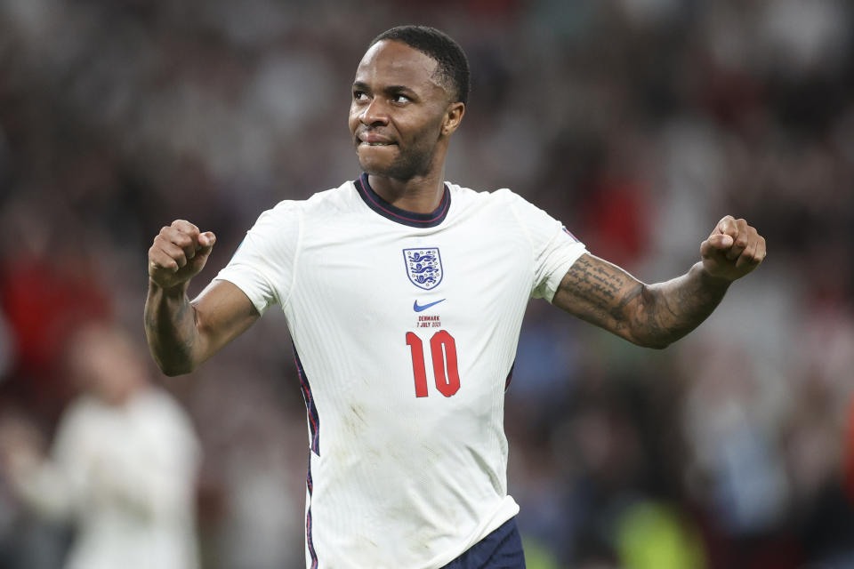 England's Raheem Sterling celebrates his side's 2-1 win at the end of the Euro 2020 soccer championship semifinal match between England and Denmark at Wembley stadium in London, Wednesday, July 7, 2021. (AP Photo/Carl Recine, Pool)