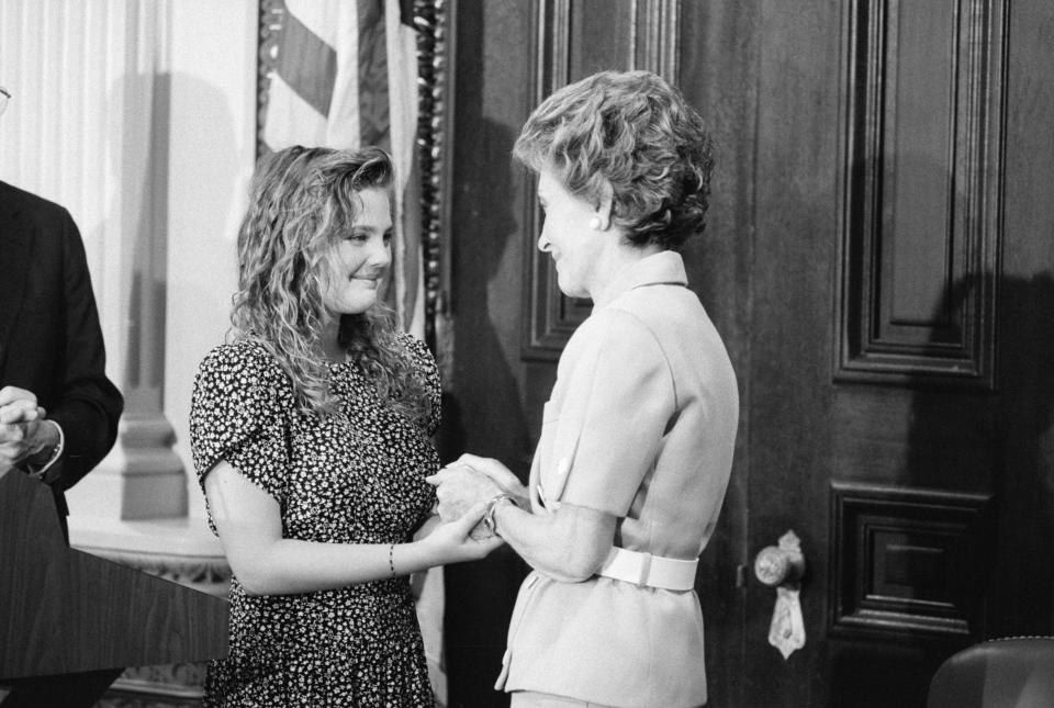 Drew Barrymore with Nancy Reagan in 1987. The actress was the face of the first lady’s “Just Say No” campaign. (Photo: Getty Images).