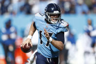 Tennessee Titans quarterback Ryan Tannehill scrambles against the Indianapolis Colts in the second half of an NFL football game Sunday, Sept. 26, 2021, in Nashville, Tenn. (AP Photo/Wade Payne)