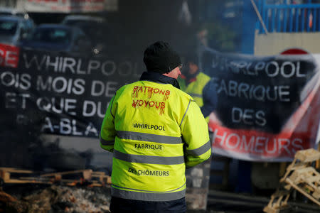 FILE PHOTO: Whirlpool employees demonstrate outside the company plant in Amiens, France, April 26, 2017. REUTERS/Pascal Rossignol/File Photo