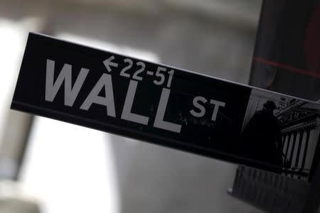 A Wall Street sign is seen in Lower Manhattan in New York, January 20, 2016. REUTERS/Mike Segar