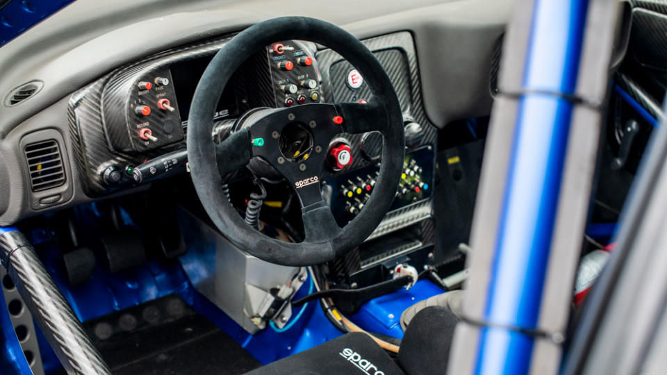 The cockpit of the 1999 Subaru Impreza WRC99 being presented by Bonhams.