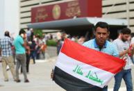 Protesters gather outside Iraq's parliament after breaking into Baghdad's heavily fortified "Green Zone" on April 30, 2016