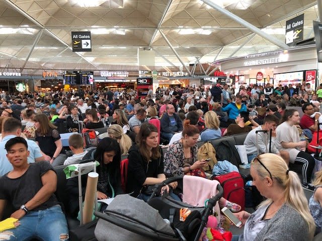 The scene in the departure lounge at Stansted after a fuel issue led to dozens of early flights being delayed or cancelled: Kate Powling