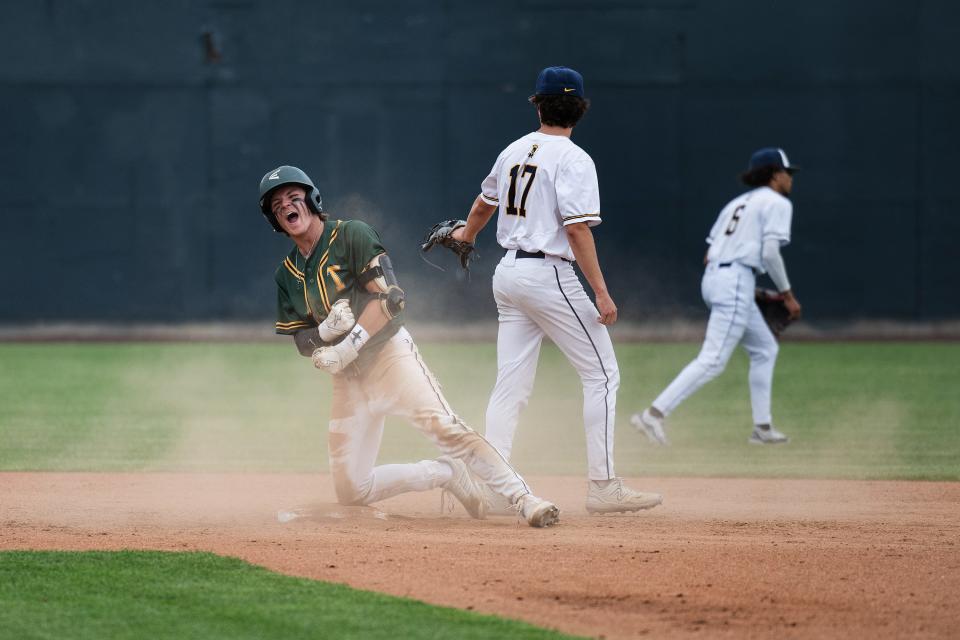 Tantasqua's Hunter Normandin celebrates a single before reaching second base on an error in the second inning.