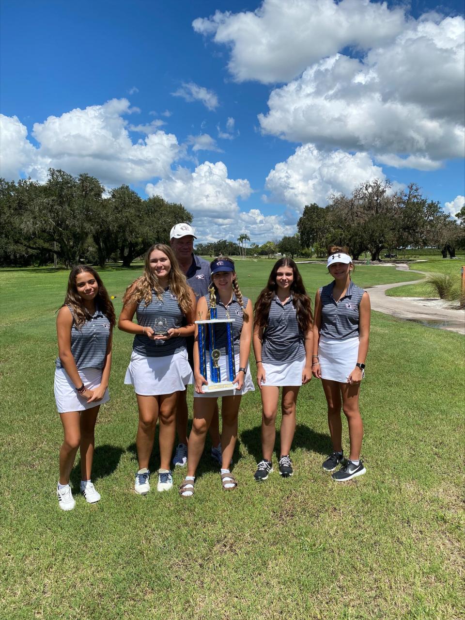 Estero High girls golf won their flight at the 2002 Crutchfield Hawkins Tournament in Sebring.