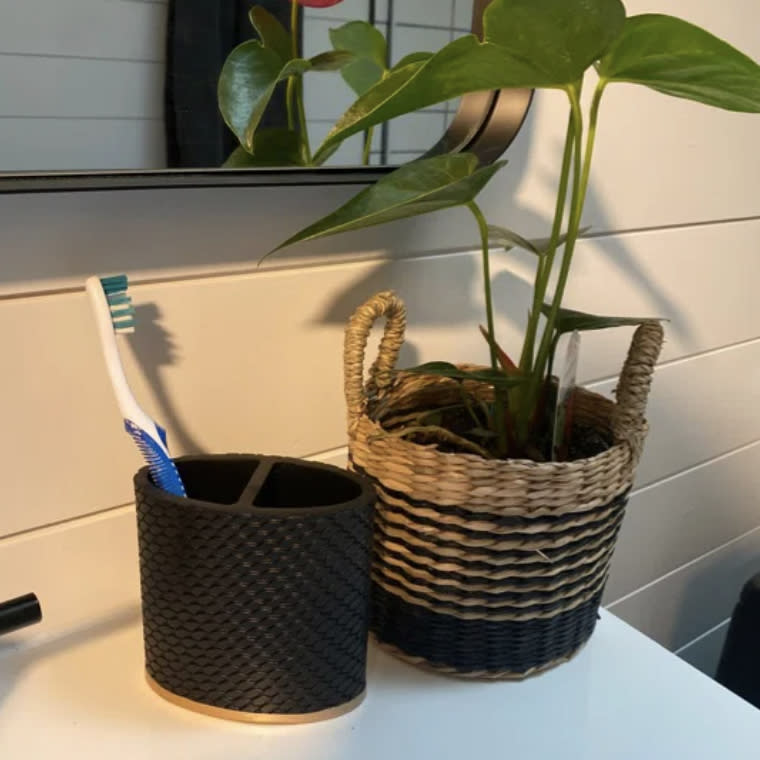 A reviewer's toothbrush holder