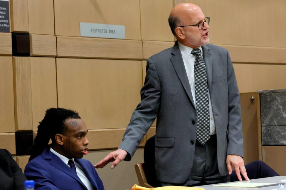 Defense attorney Stuart Adelstein motions towards Jamell Demons, better known as rapper YNW Melly, during closing arguments in his trial at the Broward County Courthouse in Fort Lauderdale on Thursday, July 20, 2023. Demons, 22, is accused of killing two fellow rappers and conspiring to make it look like a drive-by shooting in October 2018. (Amy Beth Bennett / South Florida Sun Sentinel)