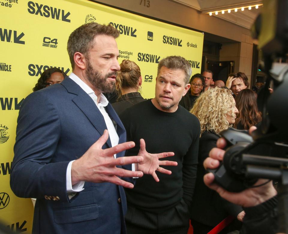 Ben Affleck, left, and Matt Damon arrive for the world premiere of "Air" at the Paramount Theatre during the South by Southwest Film & TV Festival on Saturday, March 18, 2023, in Austin, Texas. (Photo by Jack Plunkett/Invision/AP)