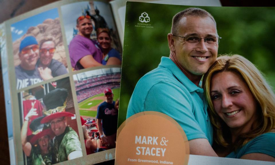 Stacey and Mark Green's adoption profile book.