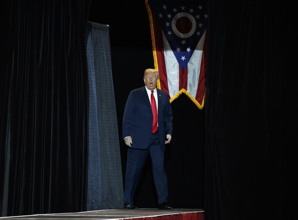 President Donald Trump arrives to speak at a campaign rally at the IX Center, in Cleveland, Monday, Nov. 5, 2018, (AP Photo/Carolyn Kaster)