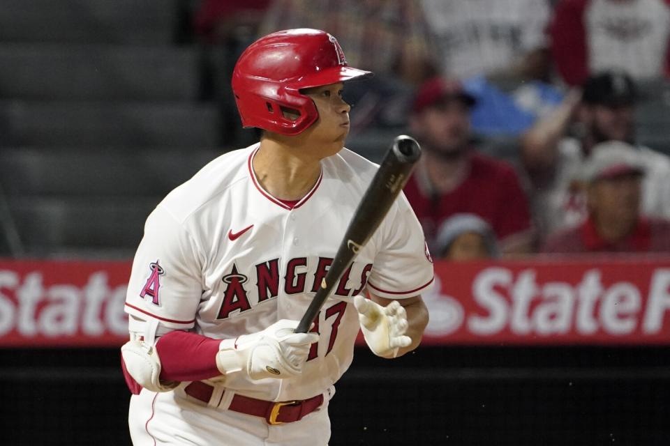 Angels' Shohei Ohtani runs to first as he grounds out during the fifth inning against the Cleveland Guardians.